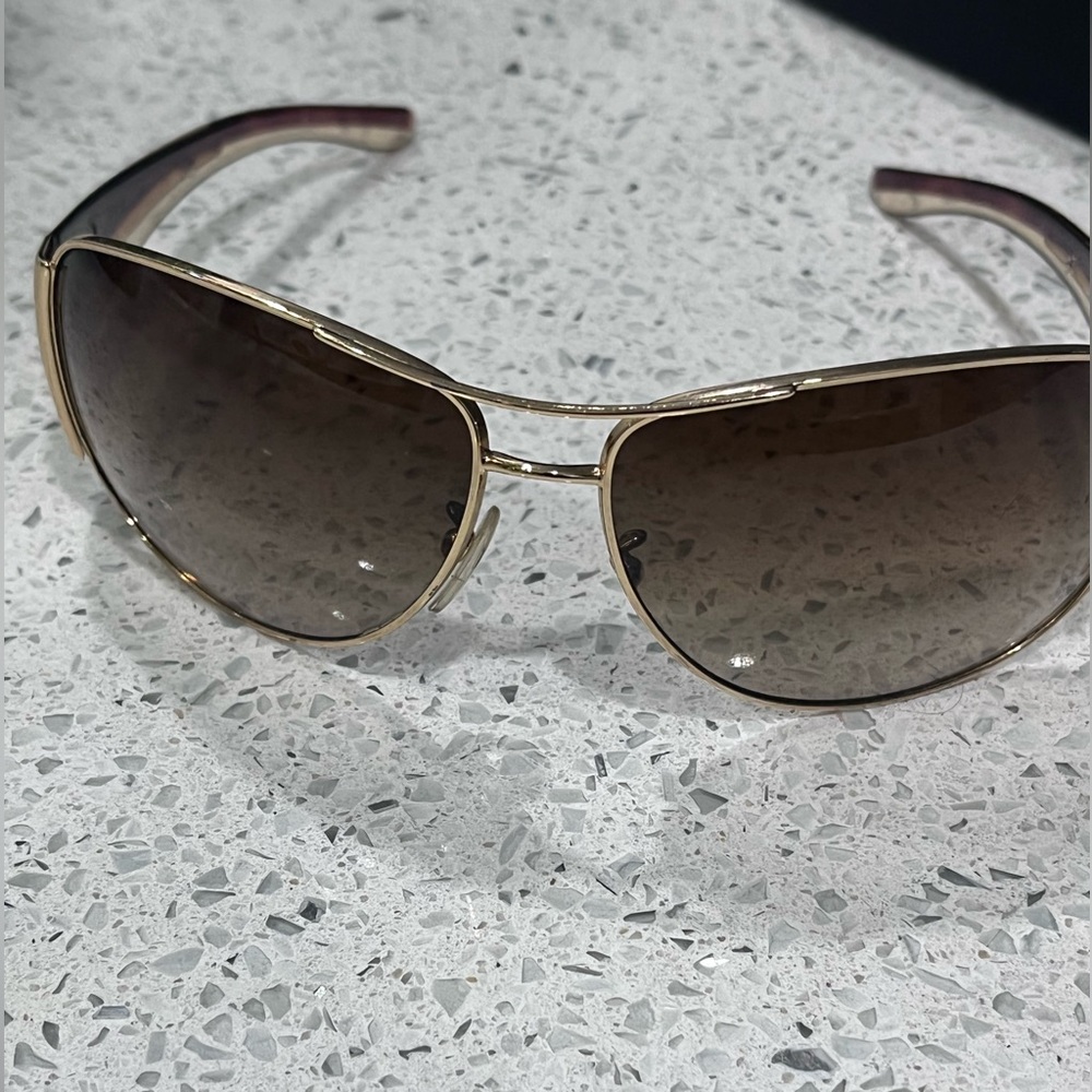 Prada gold sunglasses